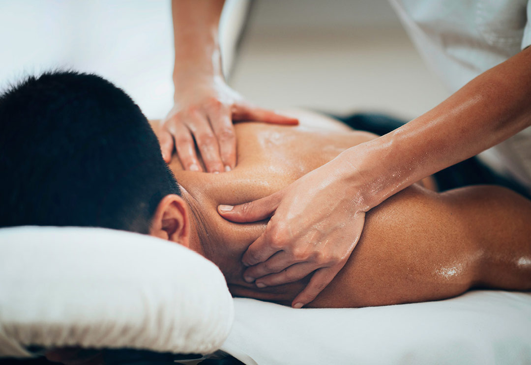 A man getting a massage at R Spa
