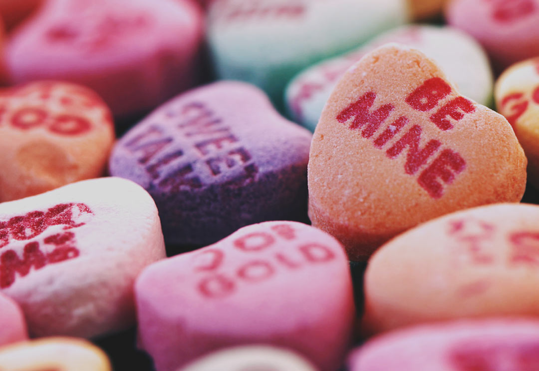 A bunch of candy Valentine conversation hearts
