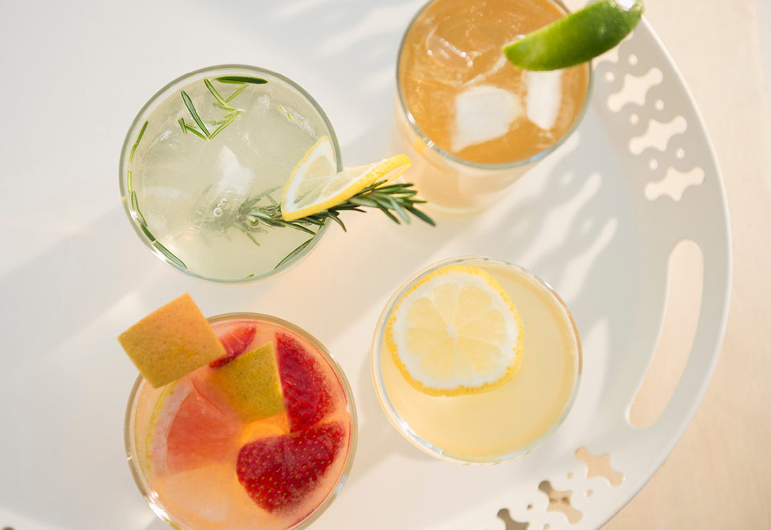 Top view of four mocktail drinks