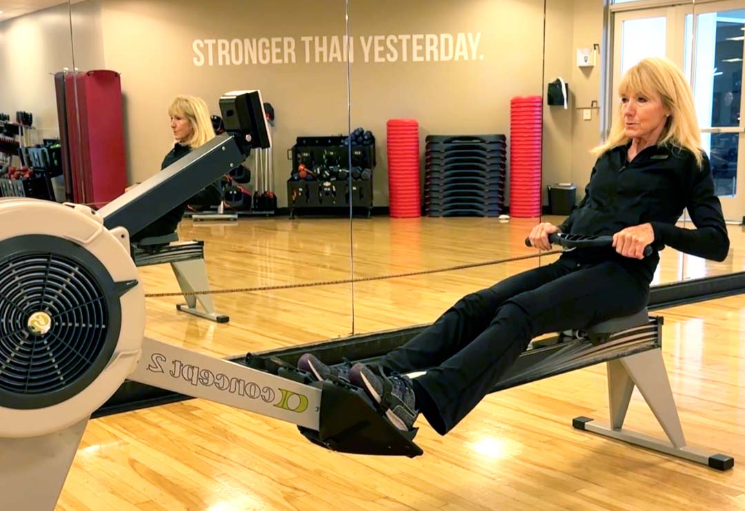 Personal Trainer Leslie Davis demonstrating proper rowing technique